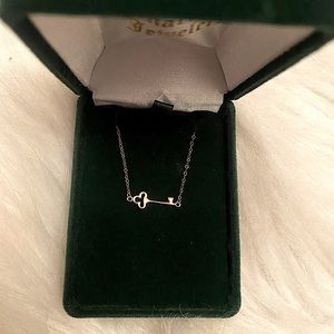 14kt gold key necklace.